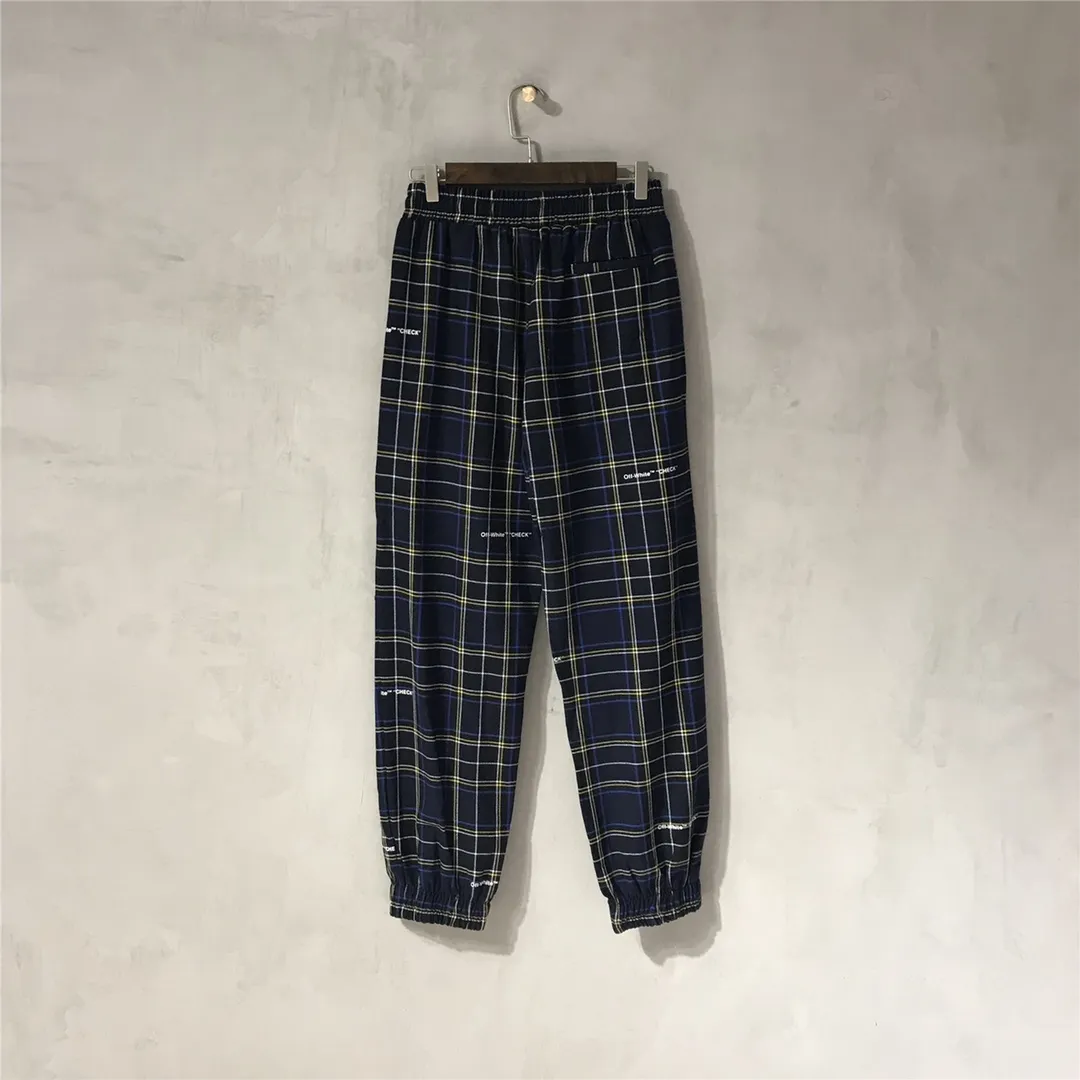 The top tested version OFF-WHITE OW blue plaid trousers, the same style pure cotton loose sweatpants for men and women couples, 380g re-woven woven pure cotton fabric, printed on cloth, the logo of the finished product appears randomly, each piece is different, the warp and weft lines are obvious, and the LOGO is clear. Size xs-L Color: Black Size chart (The waistline is elastic and can be enlarged) P:360